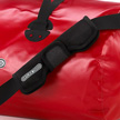 De afneembare schouderband maakt dragen van de Rack-Pack comfortabel.